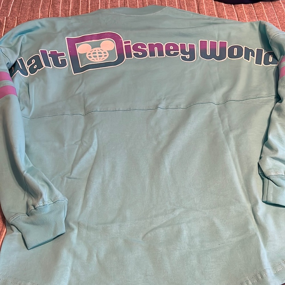 New with tags Disney World aqua spirit jersey size S